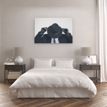 Canvas schilderij slaapkamer Zakenman Met Een Zwart Hoedje