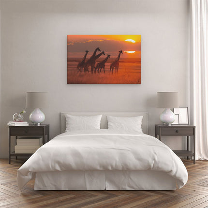 Canvas schilderij slaapkamer Giraffe Kudde Bij Zonsondergang