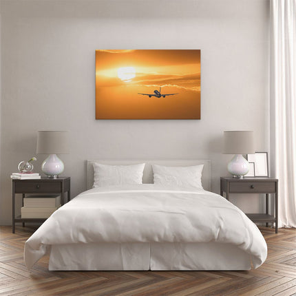 Canvas schilderij slaapkamer Vliegtuig Bij Zonsondergang