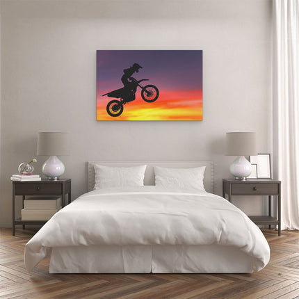 Canvas schilderij slaapkamer Silhouet Van Een Motorcross In De Lucht 