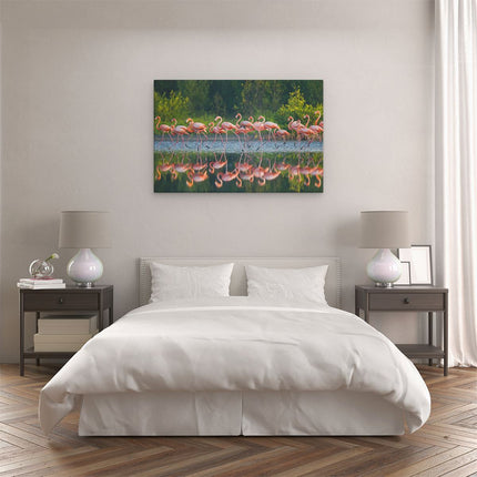 Canvas schilderij slaapkamer Kudde Flamingo's op het Water