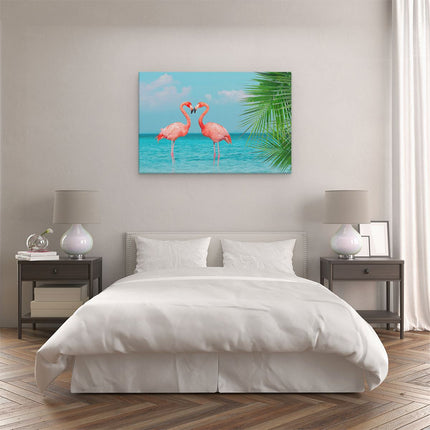 Canvas schilderij slaapkamer Twee Flamingo's in een Hart Vorm in het Water