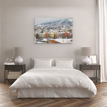 Canvas schilderij slaapkamer Gekleurde Huisjes met Sneeuw in Oostenrijk