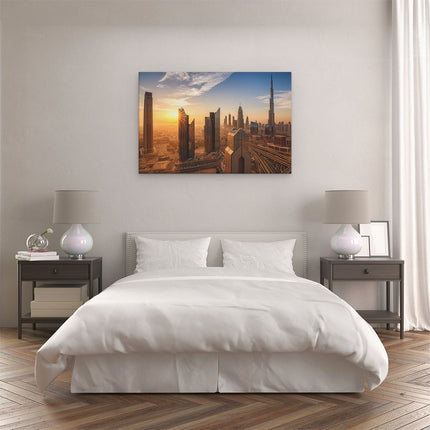 Canvas schilderij slaapkamer Dubai Stad bij Zonsopgang