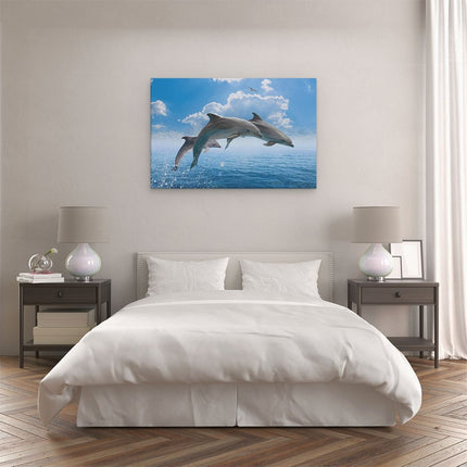 Canvas schilderij slaapkamer Dolfijnen Springen uit de Blauwe Zee