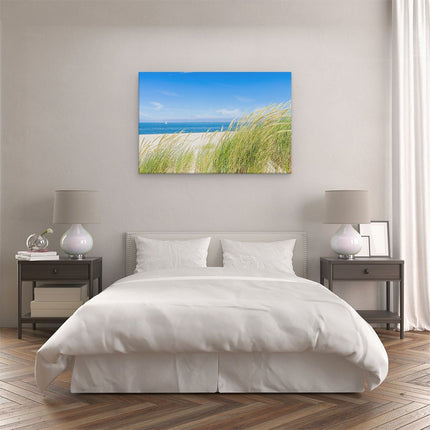 Canvas schilderij slaapkamer Strand en Zee met een Zeilboot