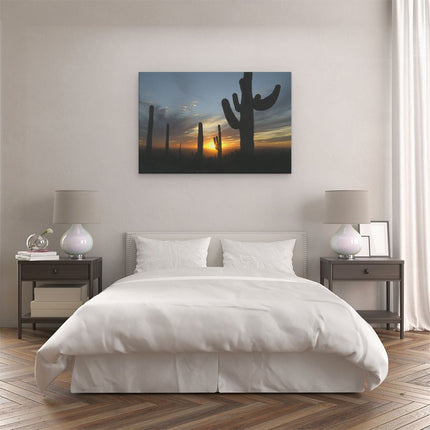 Canvas schilderij slaapkamer Cactussen bij Zonsondergang in de Woestijn