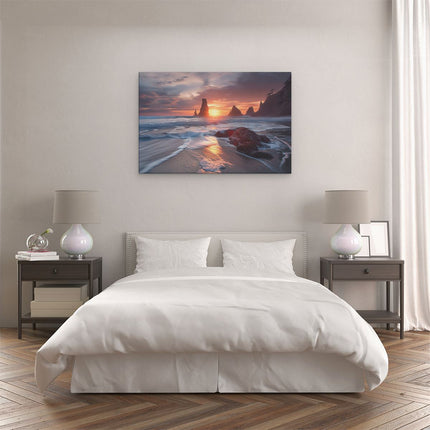 Canvas schilderij slaapkamer De Zon gaat onder boven een Strand