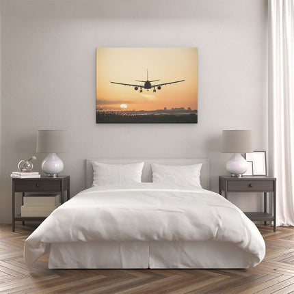 Canvas Schilderij Slaapkamer Vliegtuig Landt Tijdens Zonsondergang
