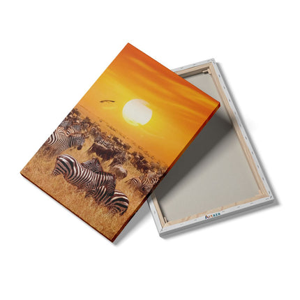 Canvas schilderij details Kudde Zebra's Bij Een Oranje Zonsondergang