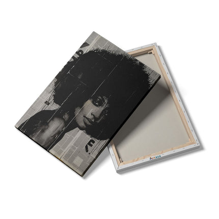 Canvas schilderij details Vrouw met een Afro op een Krant