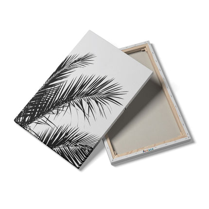 Canvas schilderij details Zwart Wit Beeld van Palmbladeren tegen een Witte Achtergrond