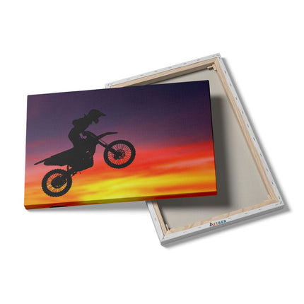 Canvas schilderij details Silhouet Van Een Motorcross In De Lucht 