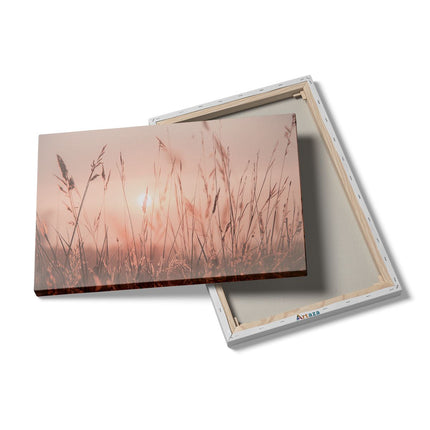 Canvas schilderij details De Zon gaat onder boven een Grasveld