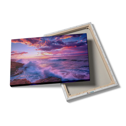 Canvas schilderij details Kleurrijke Zonsondergang over een Rotsachtige Kust