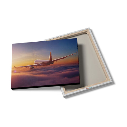 Canvas Schilderij Details Vliegtuig In De Wolken Bij Zonsondergang