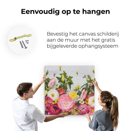 Canvas schilderij ophangen Bloemen Op Een Witte Houten Achtergrond