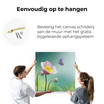 Canvas schilderij ophangen Roze Anemoon Bloem Met Een Blauwe Vlinder