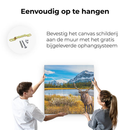 Canvas schilderij ophangen Hert In De Bergen Bij Een Meer