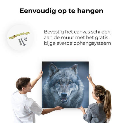 Canvas schilderij ophangen Wolvenkop Met Blauwe Ogen - Wolf