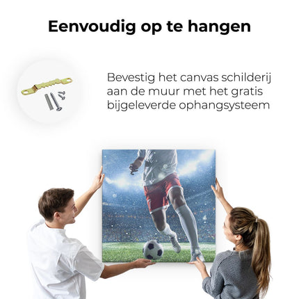 Canvas schilderij ophangen Voetbal Speler Met De Bal In Een Druk Stadion 