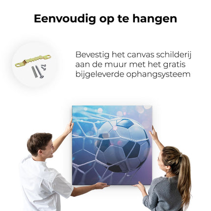 Canvas schilderij ophangen Voetbal Bal Door Het Goal Heen