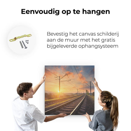 Canvas schilderij ophangen Rails Spoorweg Bij Zonsondergang