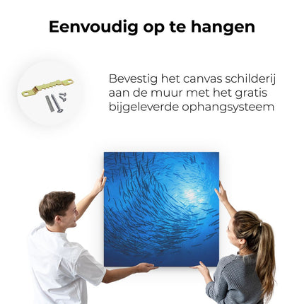 Canvas schilderij ophangen Zwerm Vissen in de Oceaan