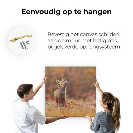 Canvas schilderij ophangen Vos in het Bos tussen de Bladeren