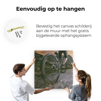 Canvas schilderij ophangen Moutainbike Fietser in de Bergen