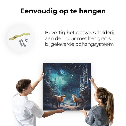 Canvas schilderij ophangen Wolven in het Bos bij de Winternacht