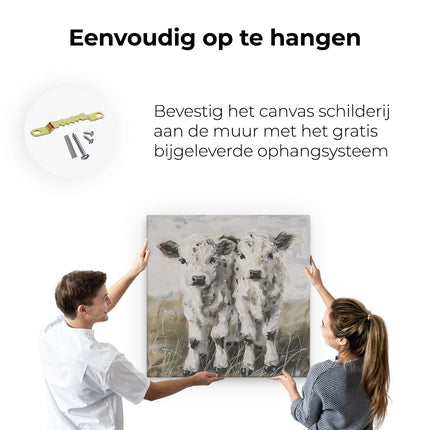 Canvas schilderij ophangen Twee Witte Koeien Staan ​​In een Veld