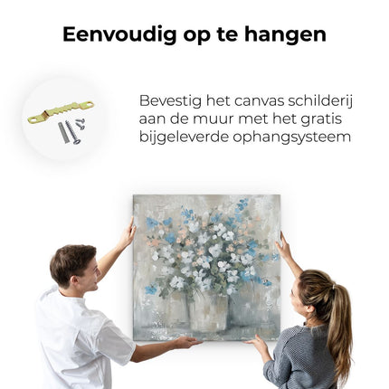 Canvas schilderij ophangen Blauwe en Witte Bloemen in een Vaas