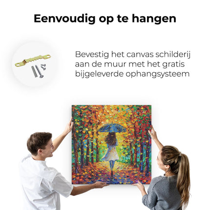 Canvas schilderij ophangen Vrouw die met een Paraplu door het Bos loopt