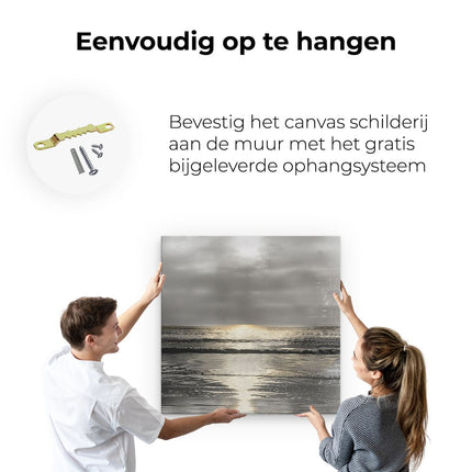 Canvas schilderij ophangen Zwart Wit Foto van een Zonsondergang op het Strand