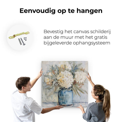 Canvas schilderij ophangen Witte Bloemen in een Blauwe Vaas