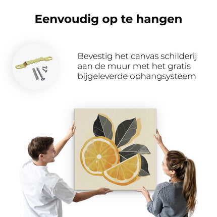 Canvas schilderij ophangen Twee Stukjes Sinaasappel met Bladeren op een Beige Achtergrond
