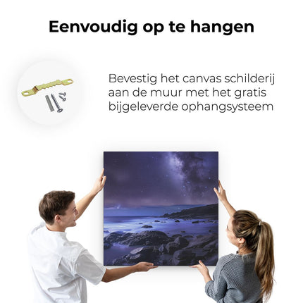 Canvas schilderij ophangen Nachtelijke Hemel met Sterren en een Rotsachtig Strand