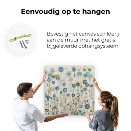 Canvas schilderij ophangen Blauwe Bloemen in een Veld