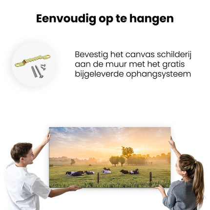 Canvas schilderij ophangen Koeien In De Wei Tijdens Zonsopgang