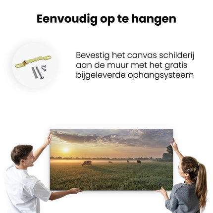 Canvas schilderij ophangen Koeien In De Wei Tijdens Zonsopkomst 