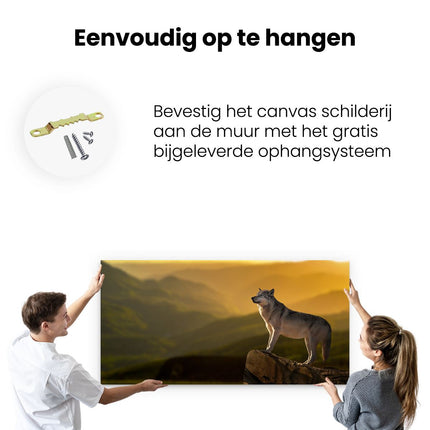 Canvas schilderij ophangen Wolf Op Een Rots Met Een Heuvel Landschap
