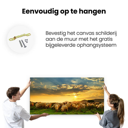 Canvas schilderij ophangen Kudde Schapen op het Gras bij Zonsondergang