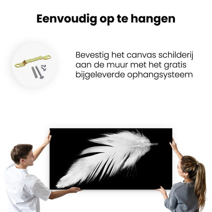 Canvas schilderij ophangen Witte Veer op een Zwarte Achtergrond