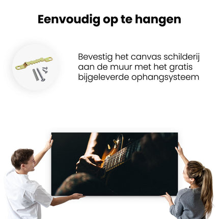 Canvas schilderij ophangen Man Speelt Gitaar