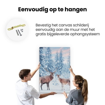 Canvas schilderij ophangen Twee Herten In Het Bos Met Sneeuw