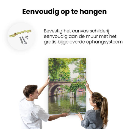 Canvas schilderij ophangen Dichtbegroeide Brug Op De Oudegracht In Utrecht