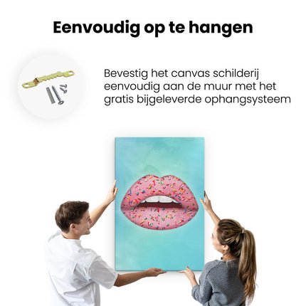 Canvas schilderij ophangen Roze Lippen met Spikkels op een Blauw Achtergrond