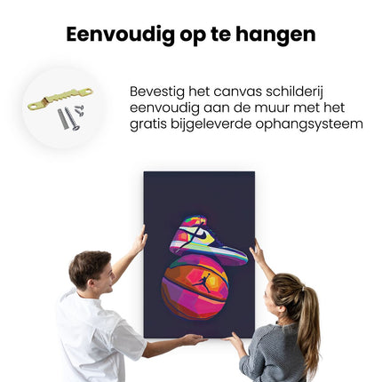 Canvas schilderij ophangen Nike Air Jordan Schoen op een Basketbal