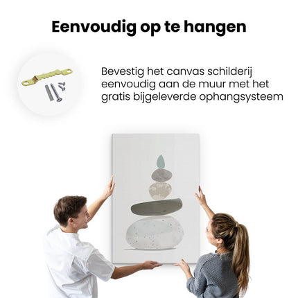 Canvas schilderij ophangen Stapel Stenen op een Witte Achtergrond
